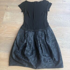 Elegant Black Short-Sleeve Midi Dress with Textured Skirt